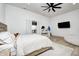 Spacious bedroom with a ceiling fan, large window, and TV at 9600 N 500 E, Pendleton, IN 46064