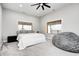 Bright bedroom with a cozy bed, large windows, and a beanbag chair at 9600 N 500 E, Pendleton, IN 46064