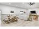 Open concept dining area with a long wooden table and bench seating at 9600 N 500 E, Pendleton, IN 46064