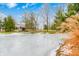 Frozen pond with gazebo in background and tall grasses at 9600 N 500 E, Pendleton, IN 46064