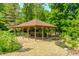 Beautiful outdoor gazebo with stone flooring and comfortable seating, perfect for relaxation and entertaining at 9600 N 500 E, Pendleton, IN 46064