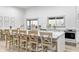 Modern kitchen with a large island and light wood barstools at 9600 N 500 E, Pendleton, IN 46064