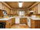 Rustic kitchen with wood cabinets and white appliances at 9600 N 500 E, Pendleton, IN 46064