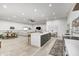 Open concept kitchen with a large island and a view into the dining and living area at 9600 N 500 E, Pendleton, IN 46064