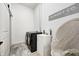 Laundry room with washer, dryer, utility sink, and stylish decor at 9600 N 500 E, Pendleton, IN 46064