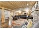Spacious living room with sectional sofa and stone fireplace at 9600 N 500 E, Pendleton, IN 46064