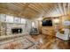 Cozy living room with stone fireplace and wood features at 9600 N 500 E, Pendleton, IN 46064