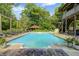 Inviting backyard pool with gazebo, slide, and lounge chairs for ultimate relaxation and outdoor enjoyment at 9600 N 500 E, Pendleton, IN 46064
