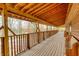 Long wooden porch with wooden benches and railings at 9600 N 500 E, Pendleton, IN 46064