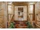 Wooden staircase with plants and rustic decor at 9600 N 500 E, Pendleton, IN 46064