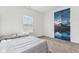 Bright bedroom with a bed, window blinds, and a mountain mural at 1075 Galaxy Ln, Danville, IN 46122