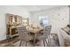 Elegant dining room with gold-toned table and chairs at 1075 Galaxy Ln, Danville, IN 46122