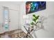 Bright entryway with glass console table and artwork at 1075 Galaxy Ln, Danville, IN 46122