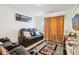 Relaxing living room with leather reclining sofas and stylish rug at 1075 Galaxy Ln, Danville, IN 46122