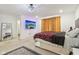 Spacious main bedroom with large TV and comfortable bed at 1075 Galaxy Ln, Danville, IN 46122