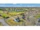 Stunning aerial view of the property and surrounding golf course at 11726 E 75Th St, Indianapolis, IN 46236