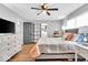Bright bedroom with a large bed and an ensuite bathroom at 11726 E 75Th St, Indianapolis, IN 46236