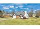 Ranch home with white siding, gray roof and two car garage at 11726 E 75Th St, Indianapolis, IN 46236