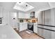 Bright kitchen boasts stainless steel appliances and hardwood floors at 11726 E 75Th St, Indianapolis, IN 46236
