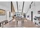 Open concept living and dining area with high ceilings and hardwood floors at 11726 E 75Th St, Indianapolis, IN 46236