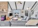 Open living space with a sectional sofa, fireplace, and high ceiling at 11726 E 75Th St, Indianapolis, IN 46236
