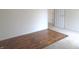 Bedroom with hardwood floor, transition to carpet and a white door at 1217 Legacy Ln, Indianapolis, IN 46234