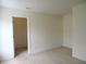 Bedroom with carpet and view into closet at 1217 Legacy Ln, Indianapolis, IN 46234