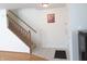 Bright entryway featuring tiled floors and a staircase, offering a welcoming transition into the home's living spaces at 1217 Legacy Ln, Indianapolis, IN 46234