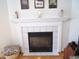 Close-up of the fireplace with a white mantle and decorative accents at 1217 Legacy Ln, Indianapolis, IN 46234