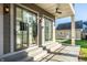 Back patio with sliding glass doors and a view of the detached garage at 1561 N Park Ave, Indianapolis, IN 46202