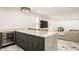 Basement wet bar with wine cooler and ample counter space at 1561 N Park Ave, Indianapolis, IN 46202