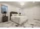 Bright basement bedroom with a comfortable bed and neutral decor at 1561 N Park Ave, Indianapolis, IN 46202