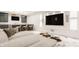 Spacious basement rec room with comfortable seating and large TV at 1561 N Park Ave, Indianapolis, IN 46202