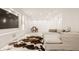 Finished basement with large sectional sofa and a cowhide rug at 1561 N Park Ave, Indianapolis, IN 46202