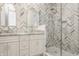 Modern bathroom with double vanity and a large walk-in shower at 1561 N Park Ave, Indianapolis, IN 46202