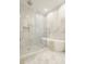 Spa-like bathroom with a freestanding tub and a large walk-in shower at 1561 N Park Ave, Indianapolis, IN 46202