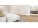 Main bedroom with ensuite bathroom and hardwood floors at 1561 N Park Ave, Indianapolis, IN 46202