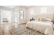 Spacious bedroom with plush bedding and access to a private balcony at 1561 N Park Ave, Indianapolis, IN 46202