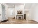Bright entryway with hardwood floors, console table, and stairs at 1561 N Park Ave, Indianapolis, IN 46202