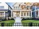 Two-story house with gray siding, front porch, and walkway at 1561 N Park Ave, Indianapolis, IN 46202