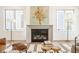 Modern fireplace with light gray mantel and artwork above at 1561 N Park Ave, Indianapolis, IN 46202