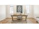 Bright home office with hardwood floors and a rustic wooden desk at 1561 N Park Ave, Indianapolis, IN 46202