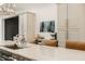 Modern kitchen with light cabinets, marble island, and stainless steel appliances at 1561 N Park Ave, Indianapolis, IN 46202