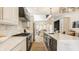 Modern kitchen with light cabinets, marble countertops, and a large island at 1561 N Park Ave, Indianapolis, IN 46202
