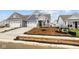 Charming two-story home featuring a two-car garage, and a well-manicured lawn, perfect for comfortable living at 16956 Cattle Hollow Ln, Noblesville, IN 46060
