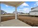 View from the back porch of a home under construction, showing backyard and neighborhood at 16964 Cattle Hollow Ln, Noblesville, IN 46060