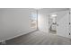 Bright bedroom with a large window offering a view of the community at 16964 Cattle Hollow Ln, Noblesville, IN 46060