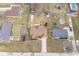 An aerial view of a single Gathering home with a driveway and backyard surrounded by a neighborhood at 2338 Malibu Ct, Anderson, IN 46012