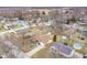An aerial view of a single Gathering home with a driveway and backyard, located in a residential neighborhood at 2338 Malibu Ct, Anderson, IN 46012