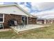 Cozy wooden deck with outdoor seating and a grill perfect for entertaining in the backyard at 2338 Malibu Ct, Anderson, IN 46012